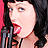 pinup cutie poses with a shotgun