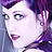 Purple haired Goth girl in purple latex couture