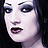 very busty black haired vampire girl in velvet