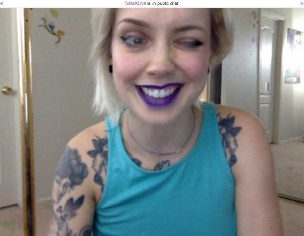 saraxlive blonde tattoo purple lipstick